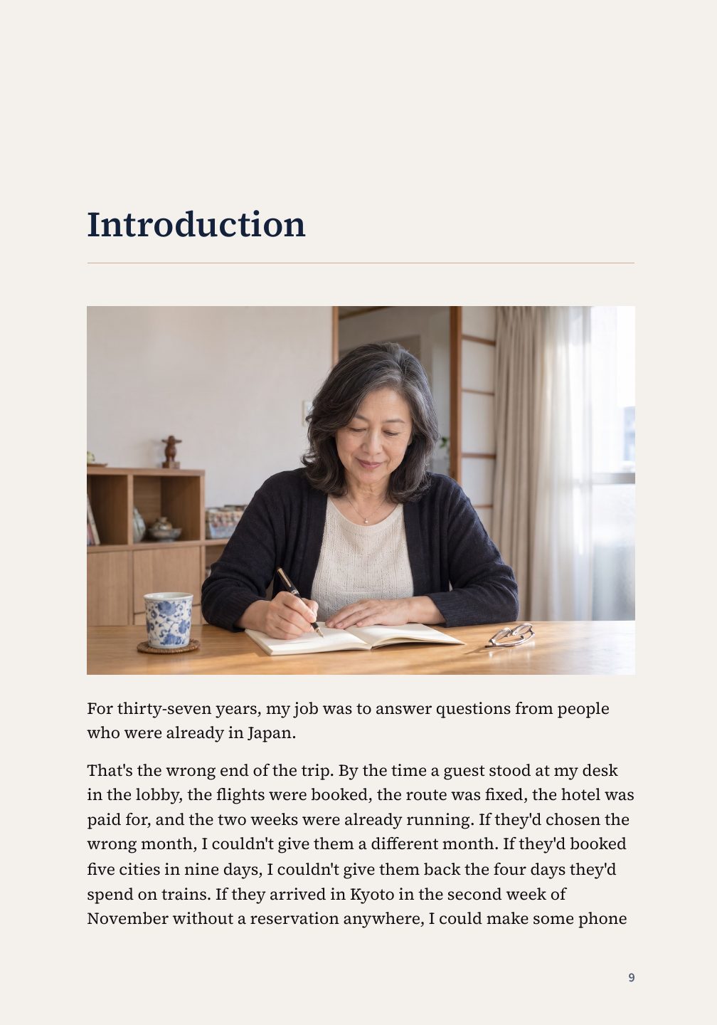 Introduction page with a photograph of Mariko writing at her table